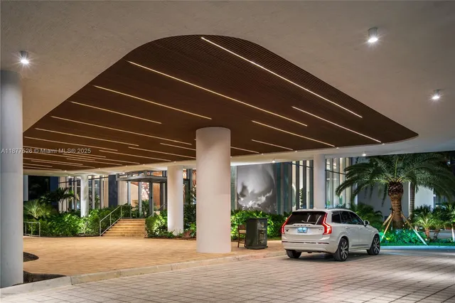 a balcony with chairs and a couch