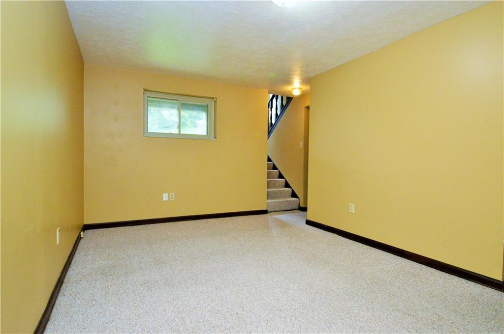 1023-1025 Moon Run Road McKees Rocks, PA 15136 - Photo 19 of 25 a view of an empty room with a window