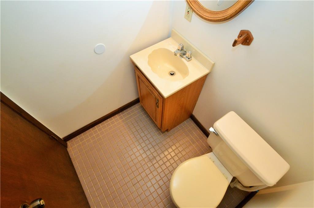 1023-1025 Moon Run Road McKees Rocks, PA 15136 - Photo 22 of 25 a bathroom with a sink toilet and mirror