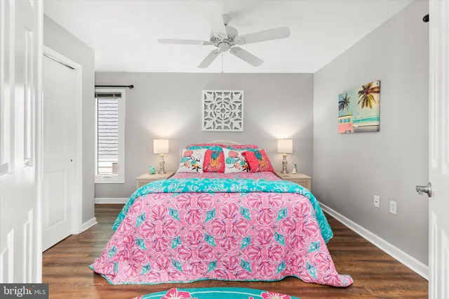 a bedroom with a bed and a table in it