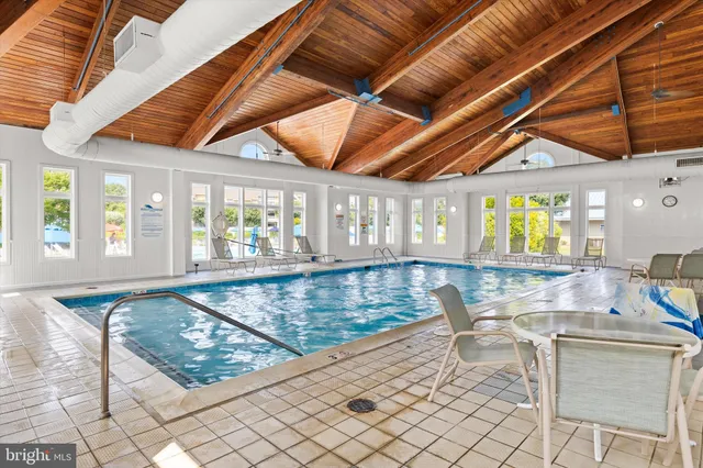 a view of swimming pool with a porch