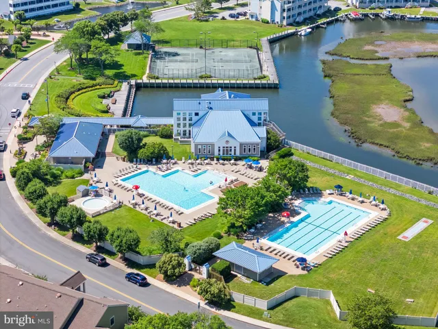 a bathroom with a shower and a mirror