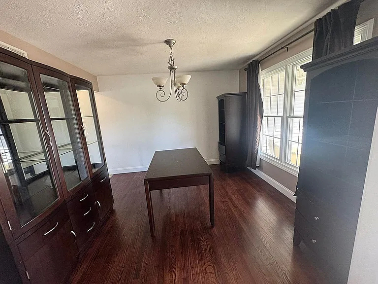 1713 Bob O Link Street Pontiac, IL 61764 - Photo 14 of 17 a view of a livingroom with furniture hardwood floor and staircase