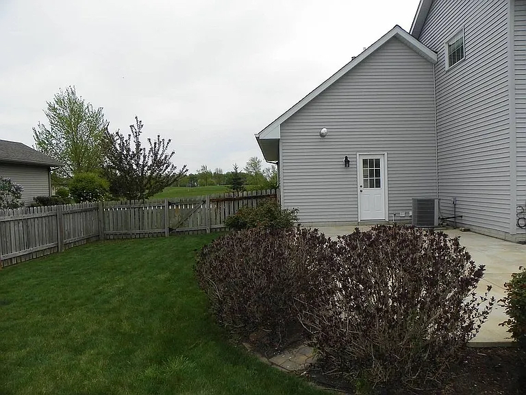 1713 Bob O Link Street Pontiac, IL 61764 - Photo 16 of 17 a house view with a garden space