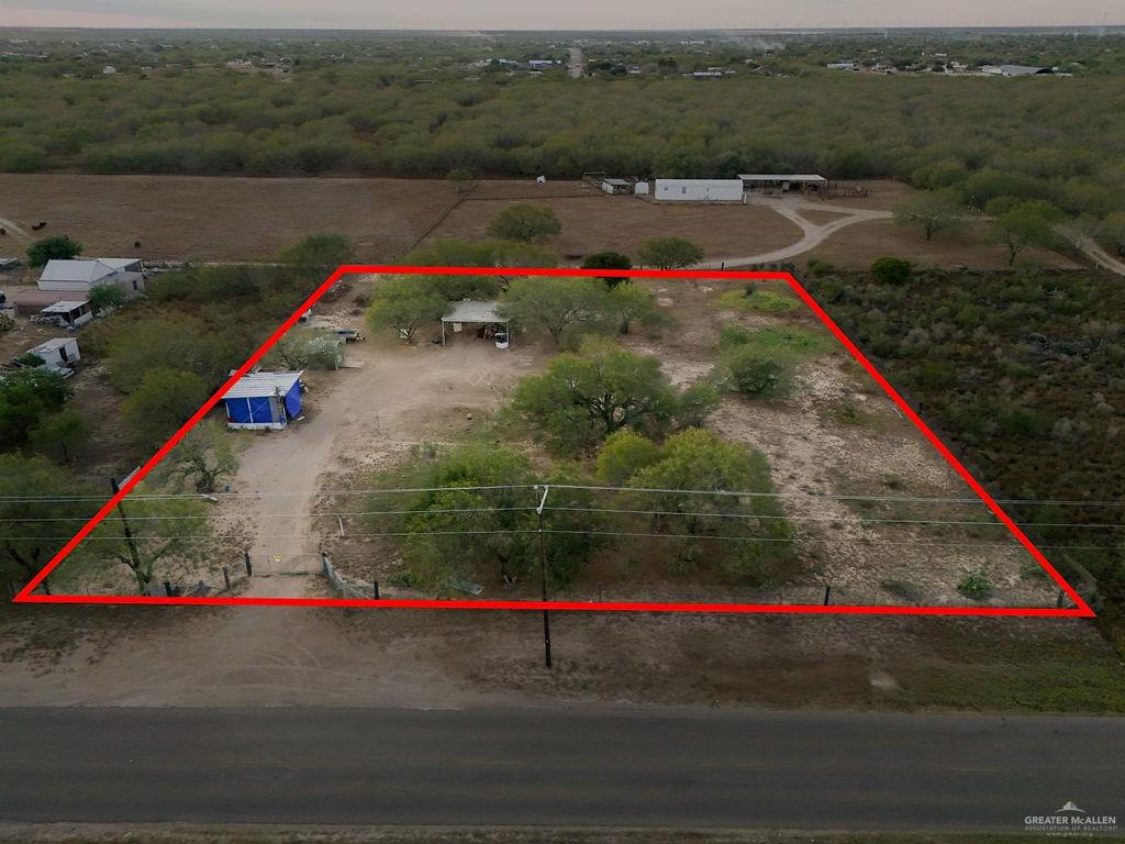 17009 Tom Gill Road Penitas, TX 78576 - Photo 11 of 15 a view of outdoor space and yard