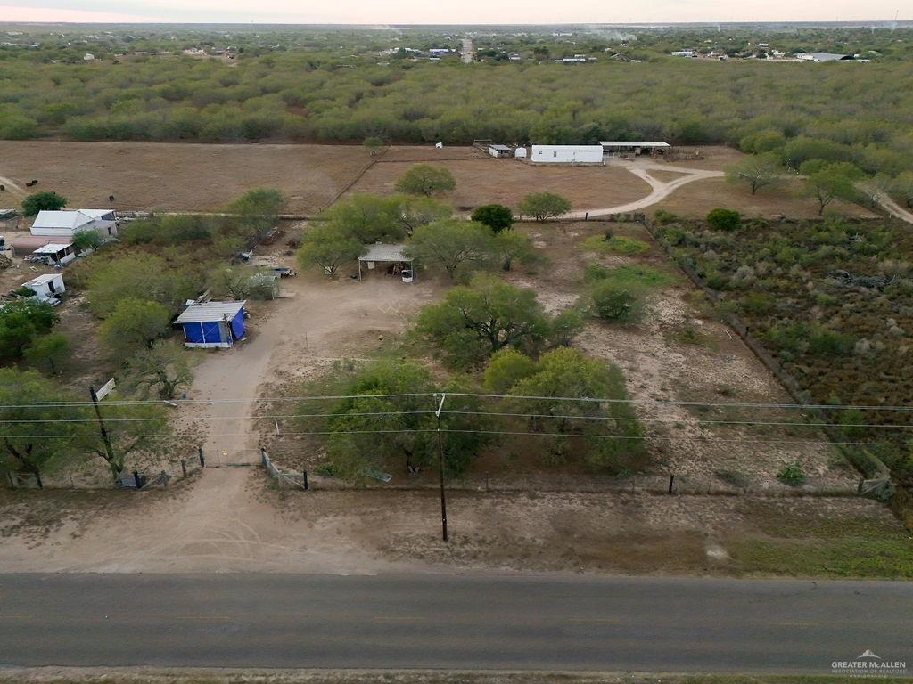 17009 Tom Gill Road Penitas, TX 78576 - Photo 3 of 15 an aerial view of a houses with a yard