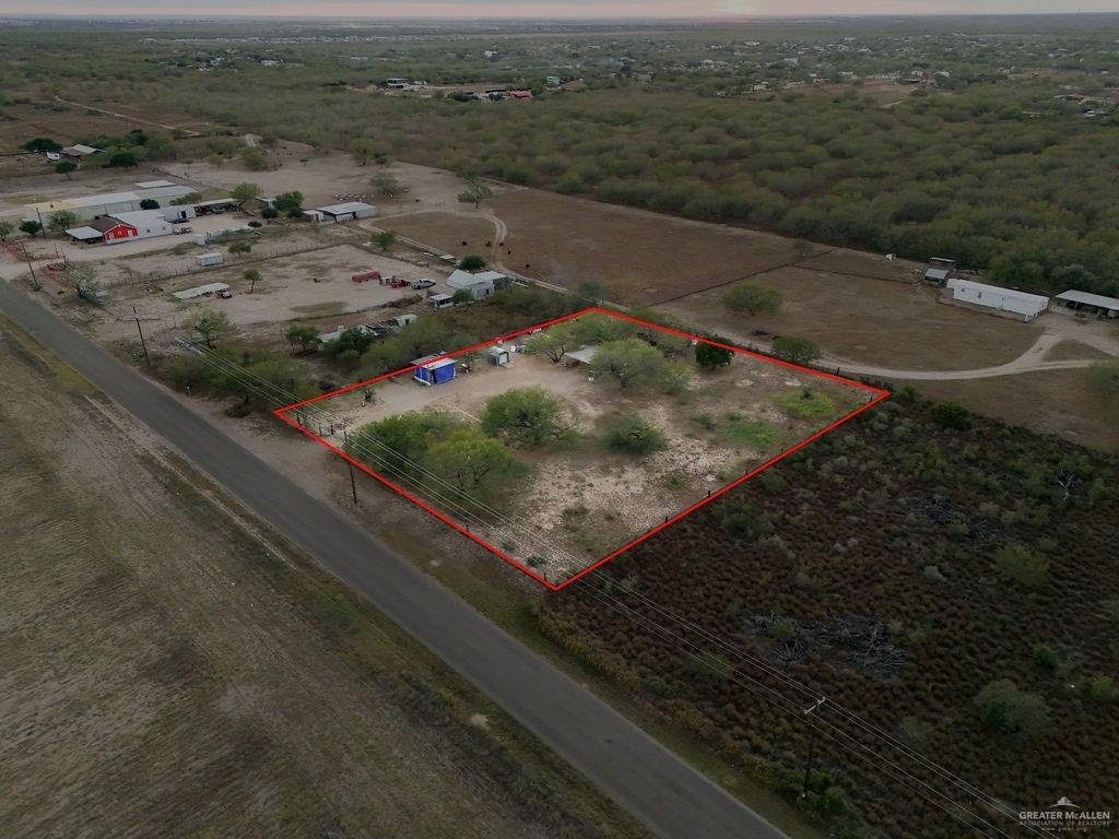 17009 Tom Gill Road Penitas, TX 78576 - Photo 9 of 15 a view of a backyard of a house