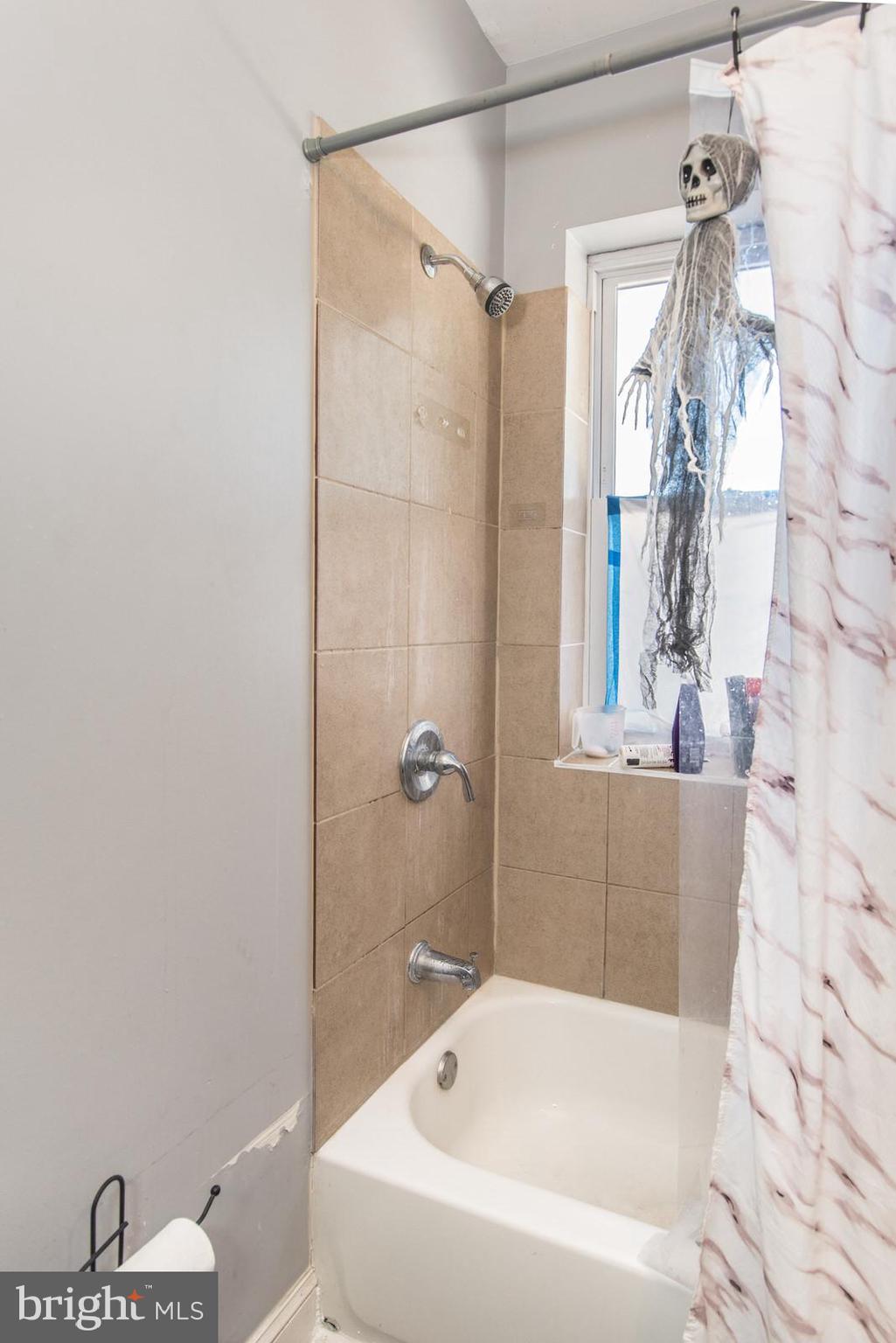 2578 Orthodox Street Philadelphia, PA 19137 - Photo 23 of 62 a bathroom with a bathtub and shower