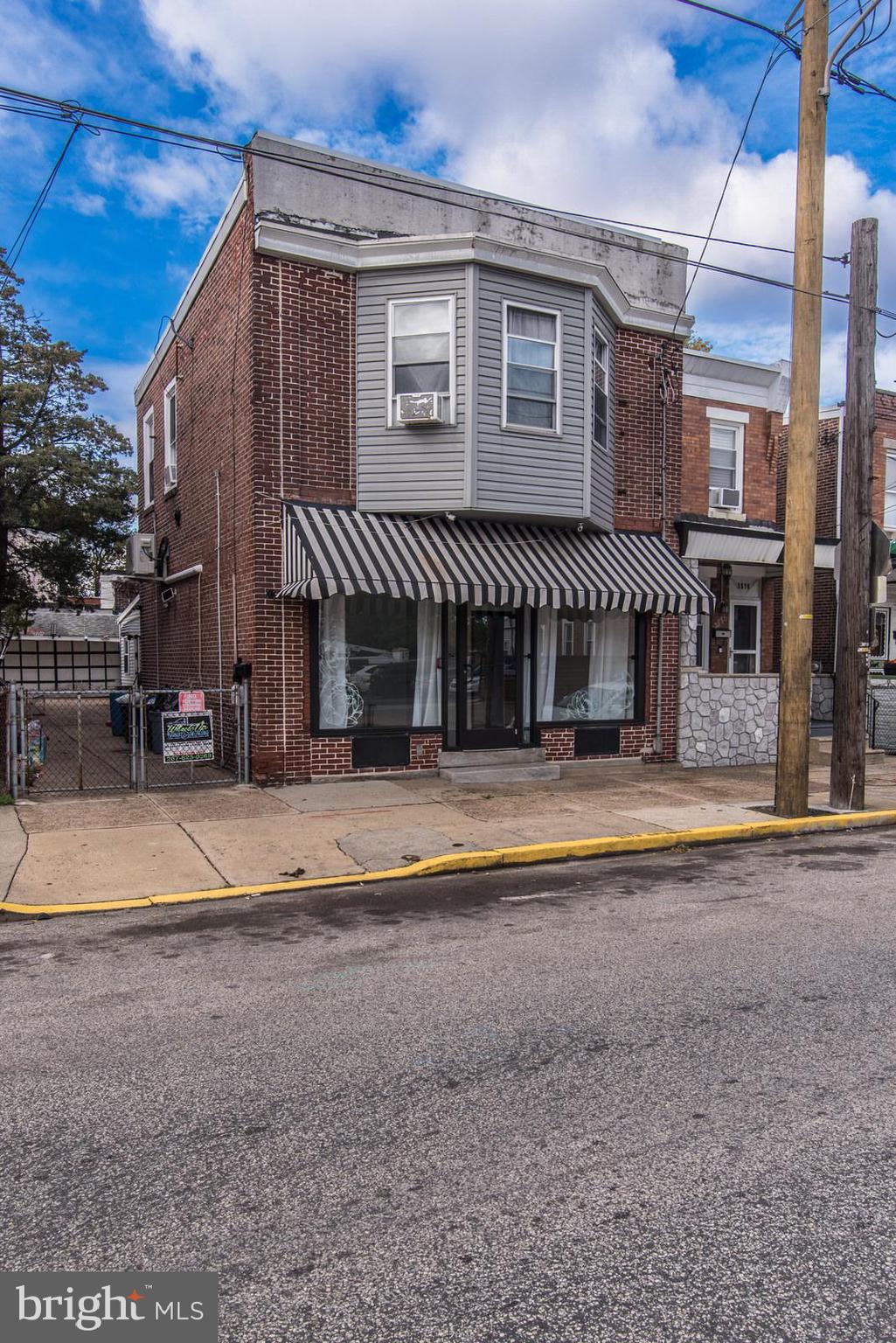 2578 Orthodox Street Philadelphia, PA 19137 - Photo 3 of 62 a front view of a house with a yard