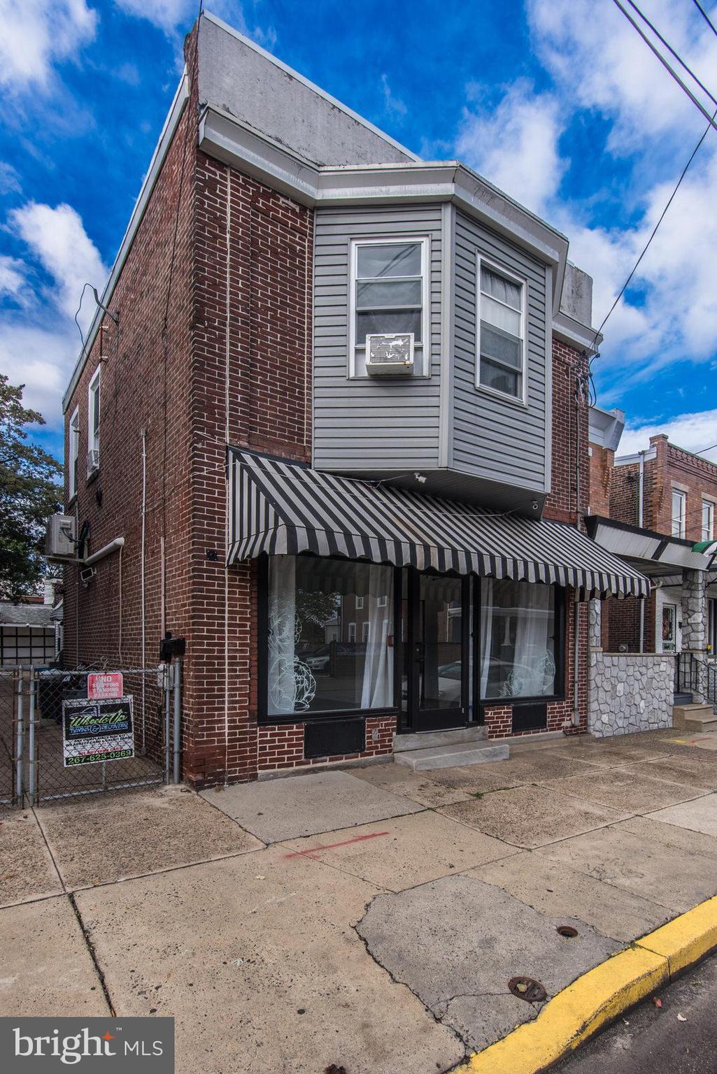 2578 Orthodox Street Philadelphia, PA 19137 - Photo 4 of 62 a front view of a house with a garage