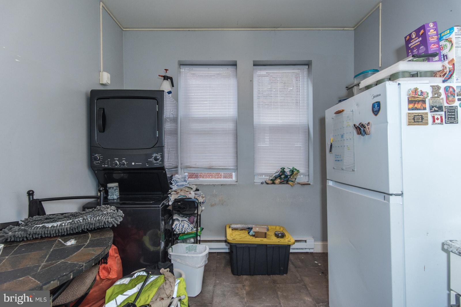 2578 Orthodox Street Philadelphia, PA 19137 - Photo 43 of 62 a kitchen with stainless steel appliances granite countertop a refrigerator and a stove