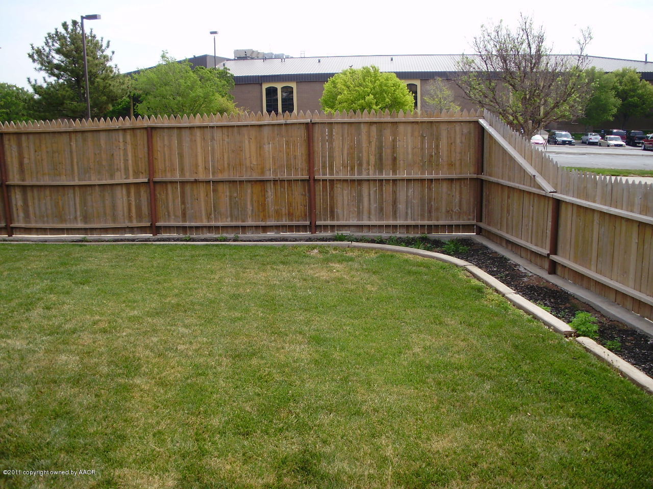8701 Circle Drive Amarillo, TX 79110 - Photo 15 of 19 Back Yard & Flower Bed Curbing