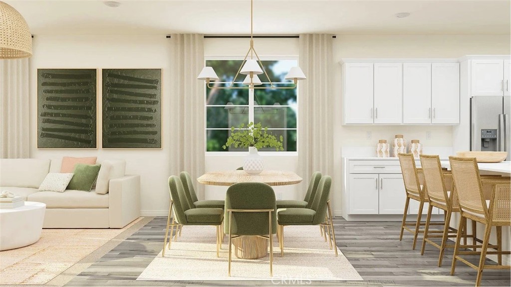 1707 Eagle Road Rialto, CA 92376 - Photo 4 of 18 a view of a dining room with furniture and wooden floor