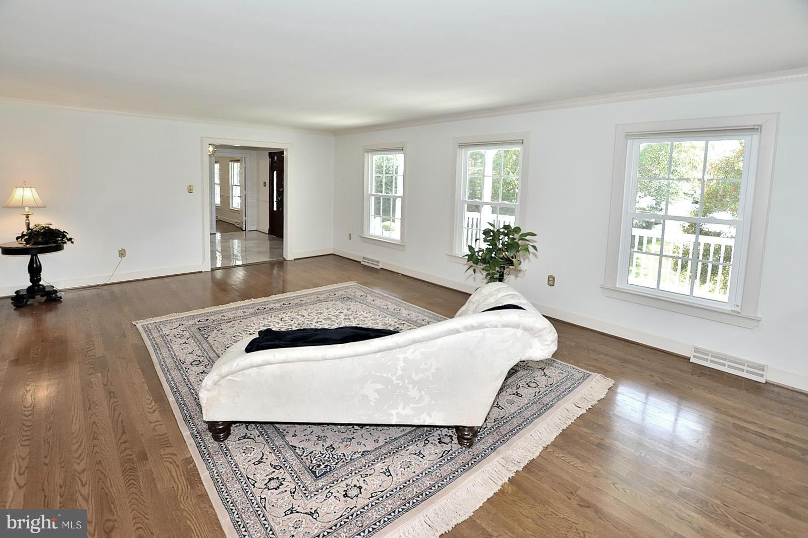 2805 Rifle Ridge Road Oakton, VA 22124 - Photo 8 of 30 a bed sitting in a bedroom next to a window