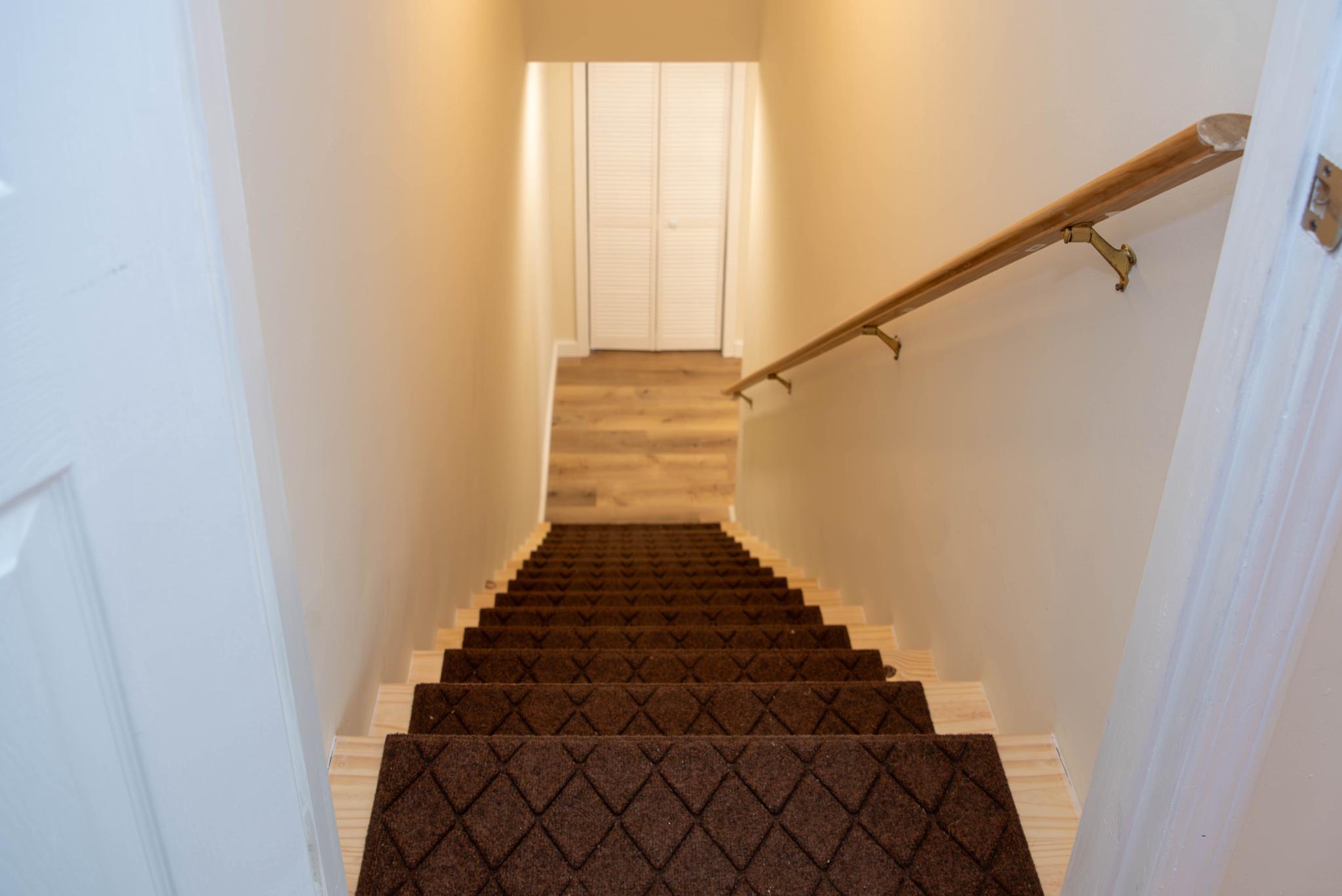 792 Forest Glen Road Moorefield, WV 26836 - Photo 91 of 146 Inviting staircase to lower level.