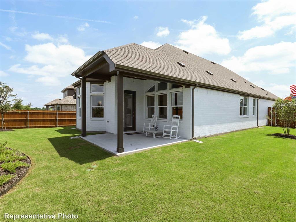 3729 Pitchfork Terrace Anna, TX 75409 - Photo 17 of 17 a view of a house with backyard and porch