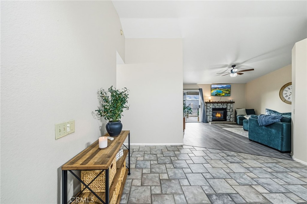 29787-29787 Berea Road Menifee, CA 92584 - Photo 11 of 45 a living room with furniture and a potted plant