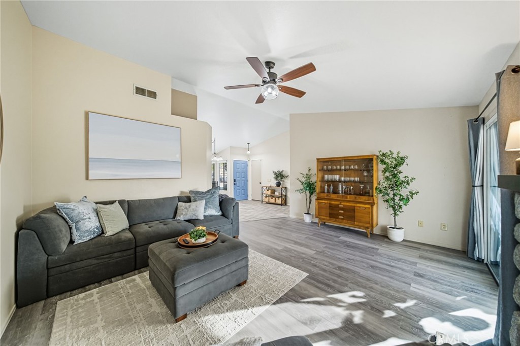 29787-29787 Berea Road Menifee, CA 92584 - Photo 25 of 45 a living room with furniture and a flat screen tv