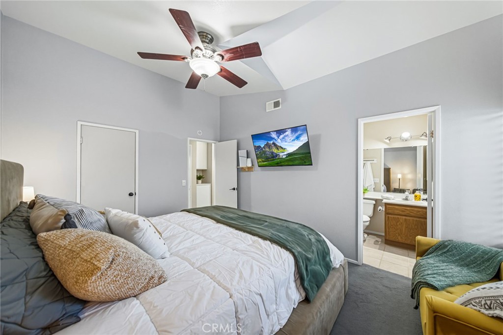 29787-29787 Berea Road Menifee, CA 92584 - Photo 31 of 45 a bedroom with a bed and ceiling fan