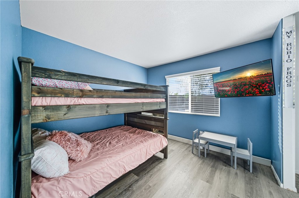 29787-29787 Berea Road Menifee, CA 92584 - Photo 33 of 45 a bedroom with a bed and a window