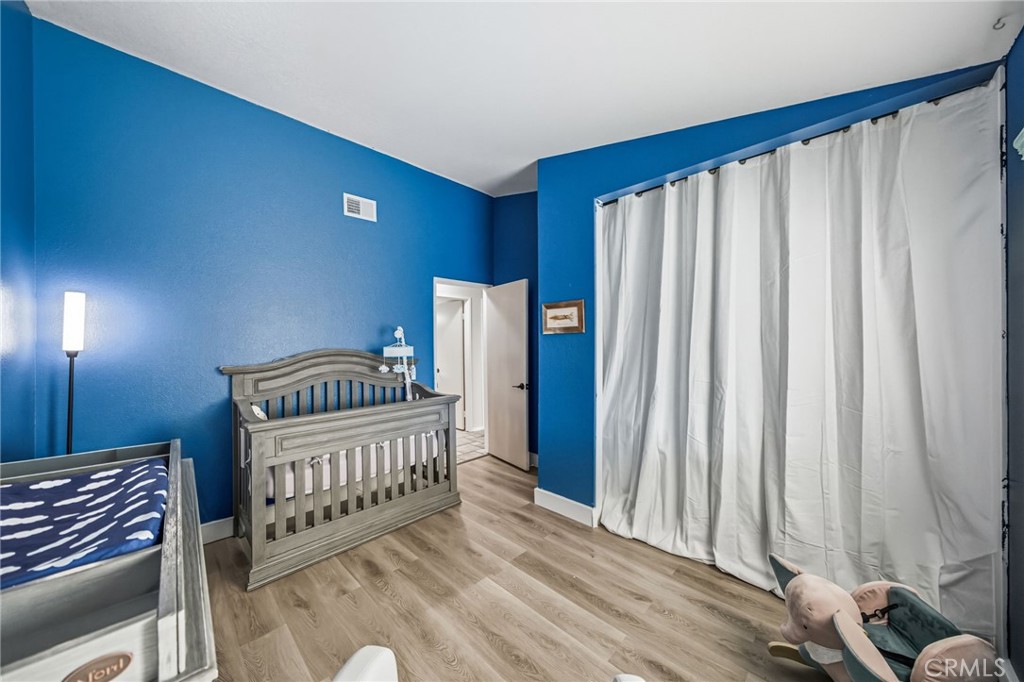 29787-29787 Berea Road Menifee, CA 92584 - Photo 36 of 45 a view of a balcony with wooden floor