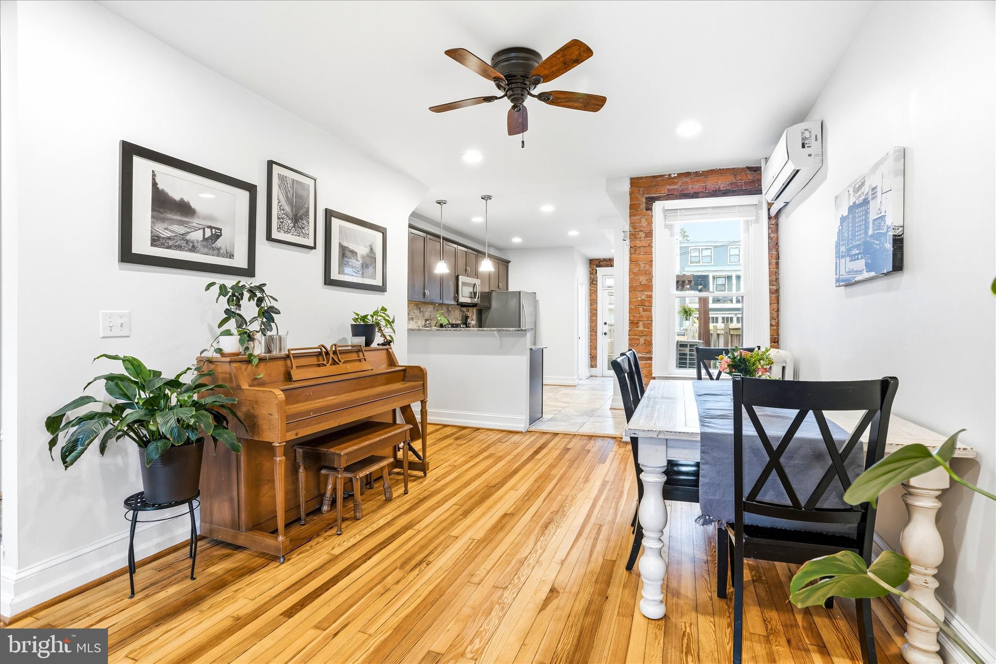 205 East 4th Street Frederick, MD 21701 - Photo 5 of 38 a room with dining table chairs and wooden floor