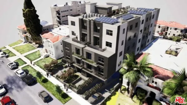 an aerial view of multi story residential apartment building