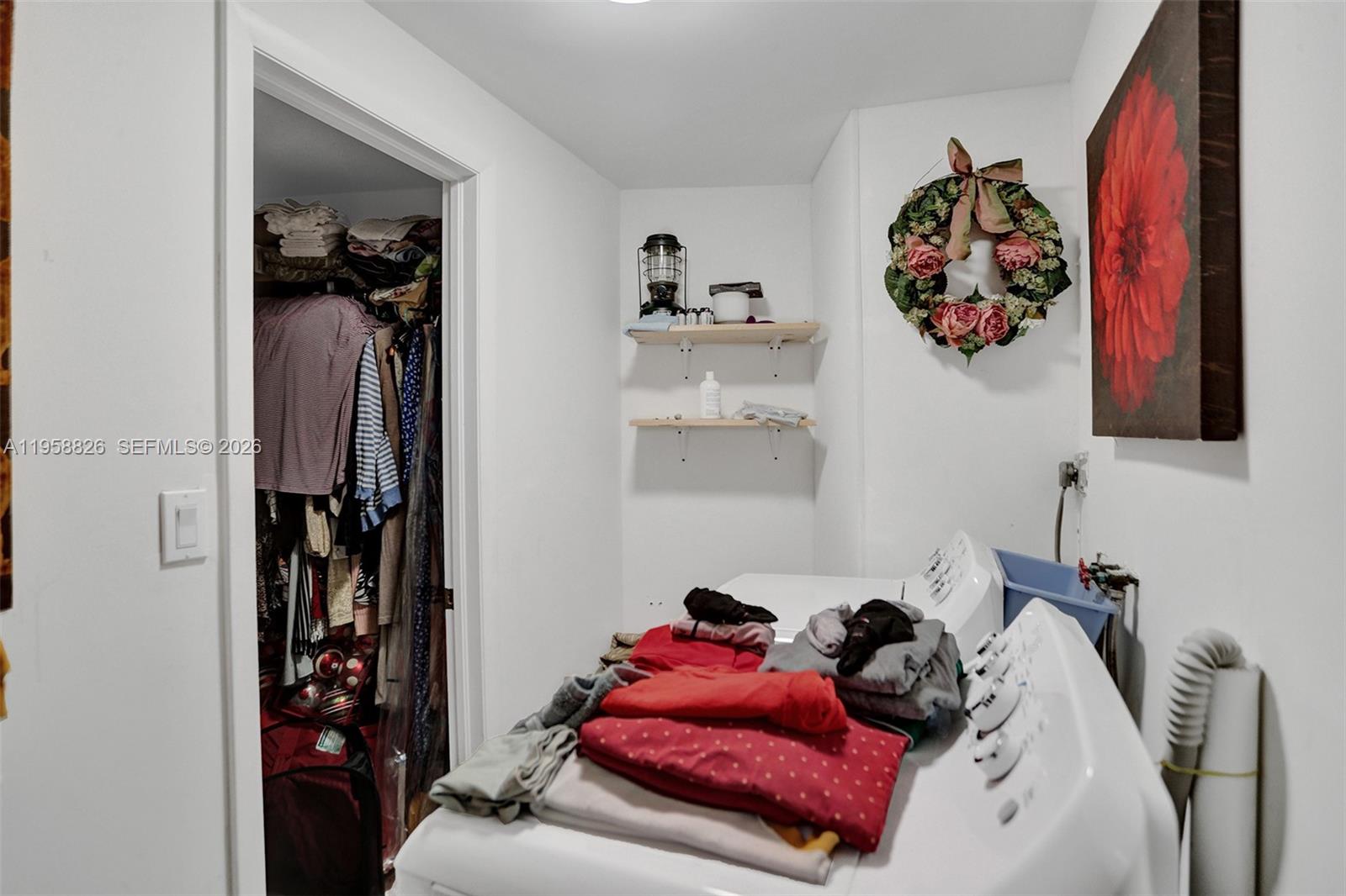 3255 Southwest 60th Avenue Miami, FL 33155 - Photo 12 of 42 a bedroom with a bed and a window