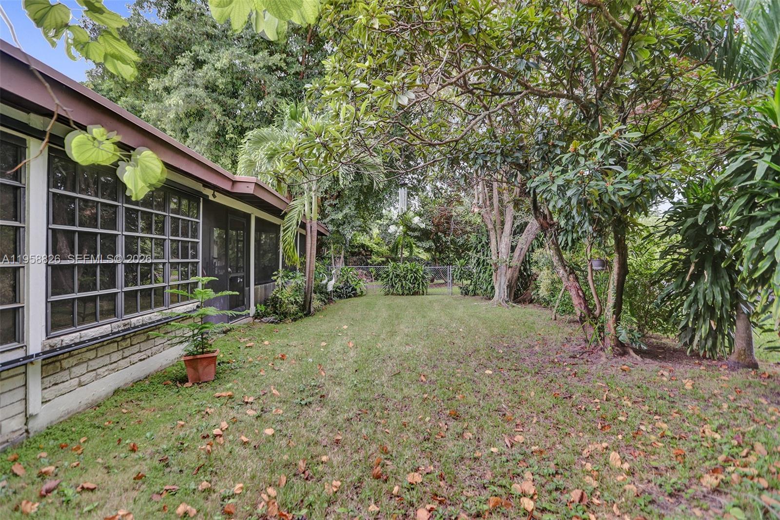 3255 Southwest 60th Avenue Miami, FL 33155 - Photo 9 of 42 a view of backyard with green space