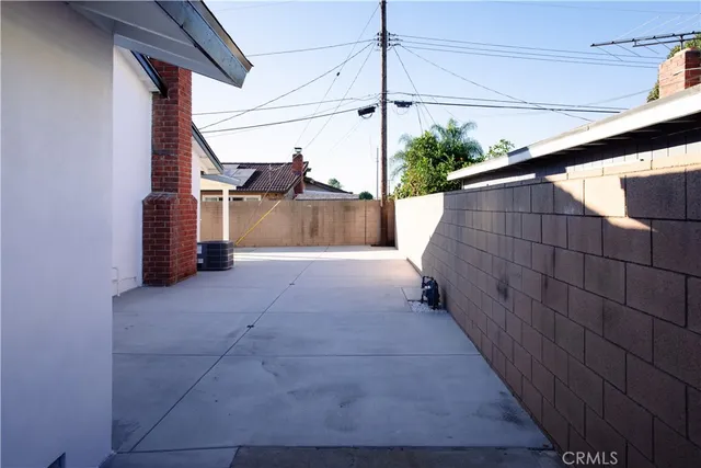 a view of a house with a street