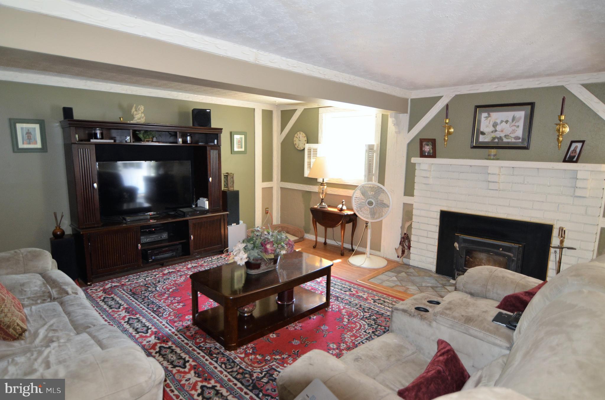 820 Petem Road Kingsville, MD 21087 - Photo 13 of 30 a living room with furniture and a flat screen tv