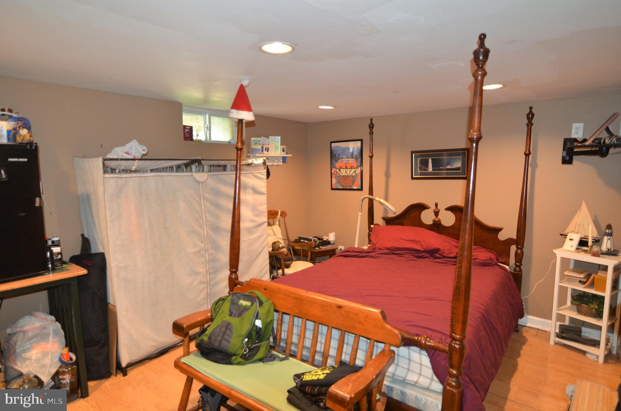 820 Petem Road Kingsville, MD 21087 - Photo 15 of 30 a bedroom with furniture and a mirror