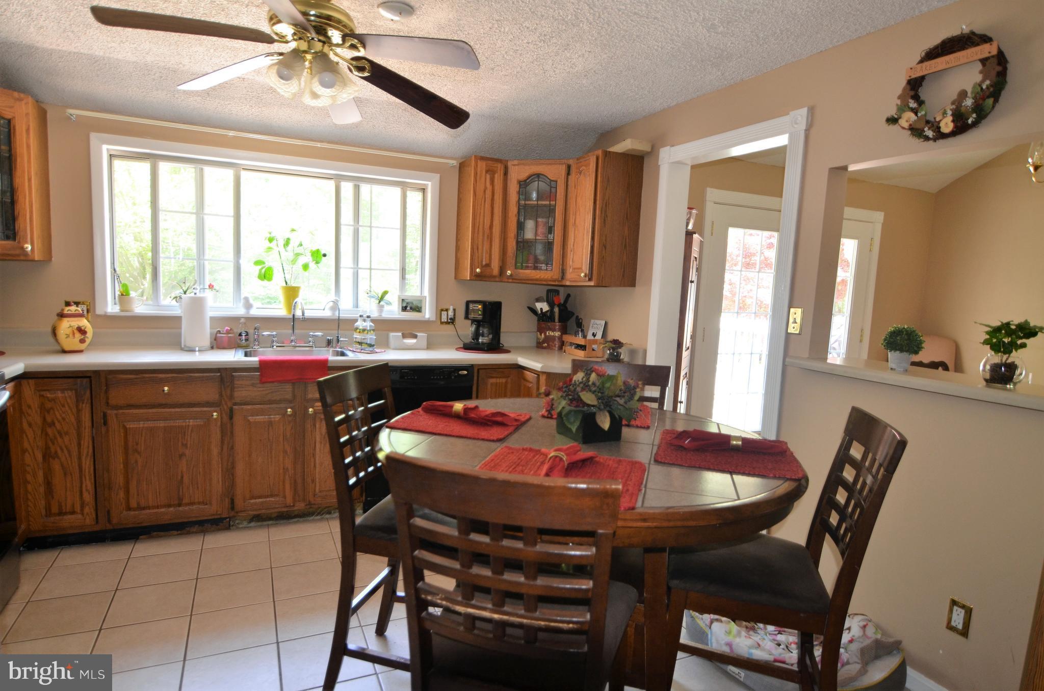 820 Petem Road Kingsville, MD 21087 - Photo 16 of 30 a view of a dining room with furniture and window