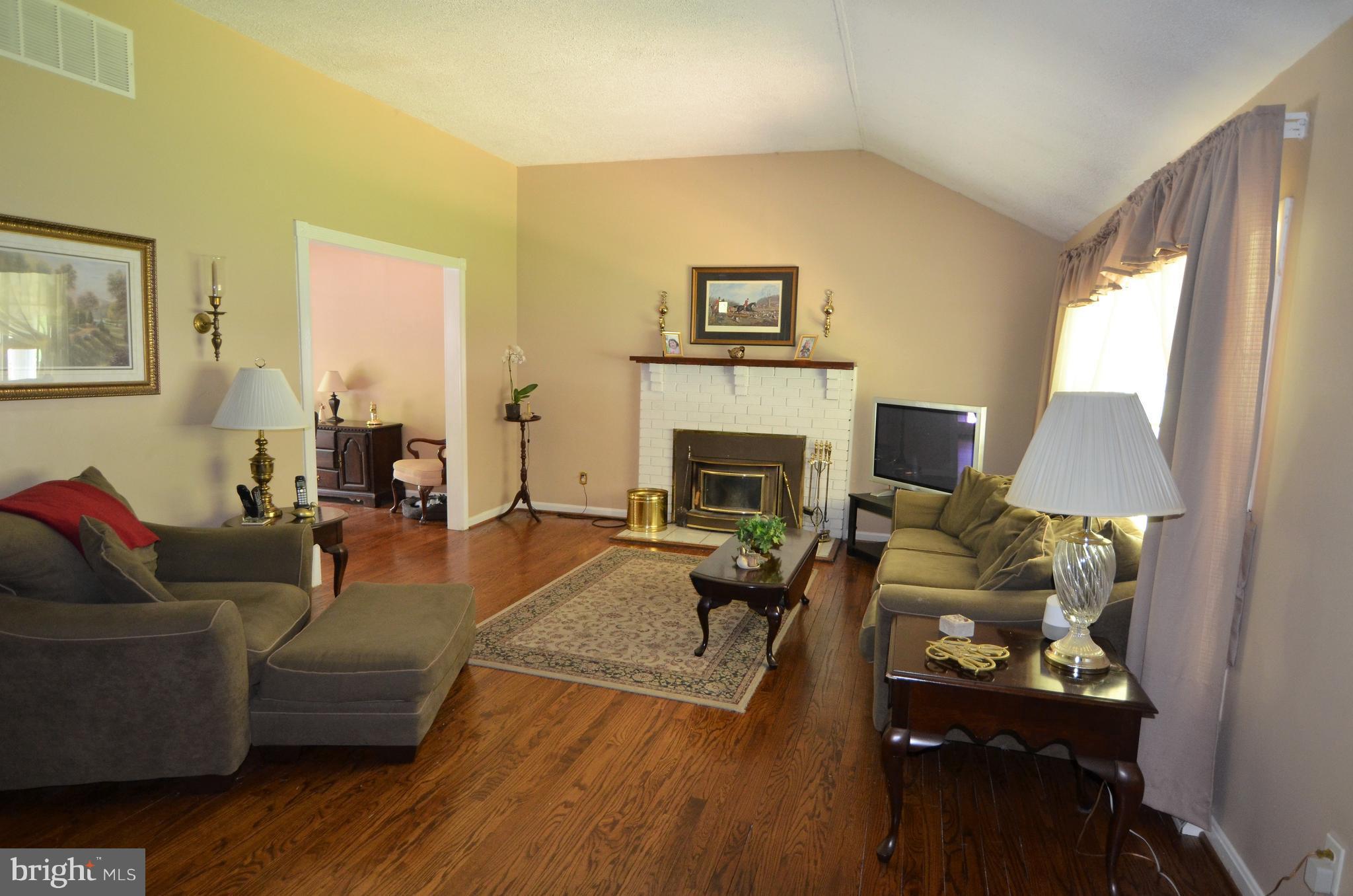 820 Petem Road Kingsville, MD 21087 - Photo 17 of 30 a living room with furniture and a fireplace