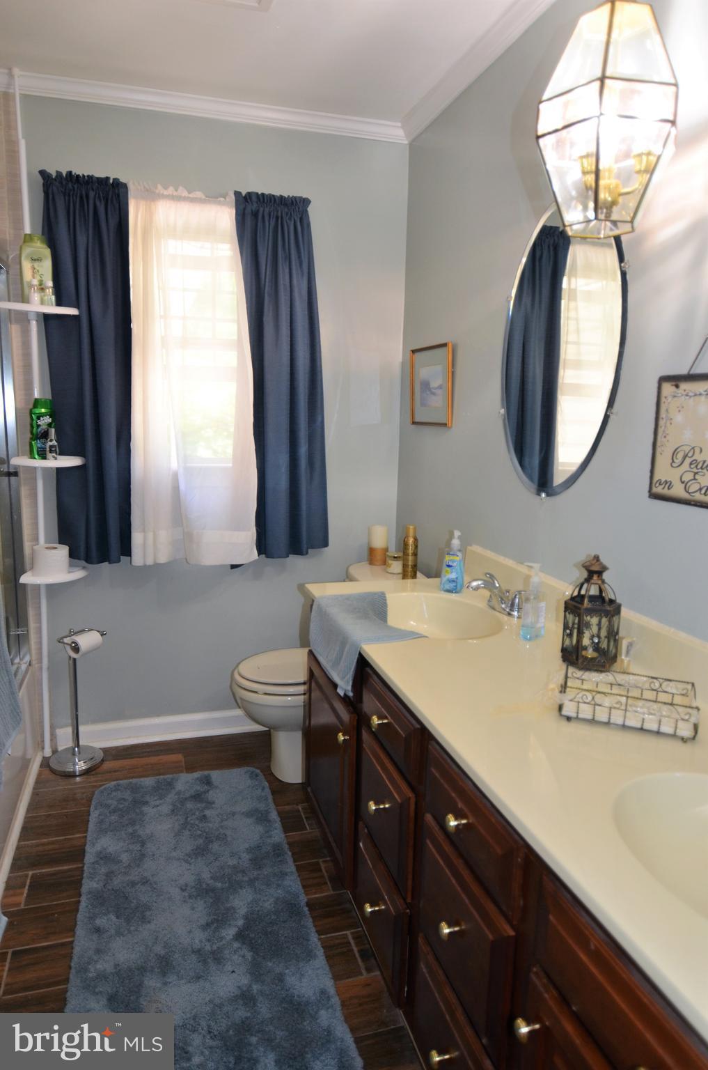 820 Petem Road Kingsville, MD 21087 - Photo 20 of 30 a bathroom with a sink and a mirror