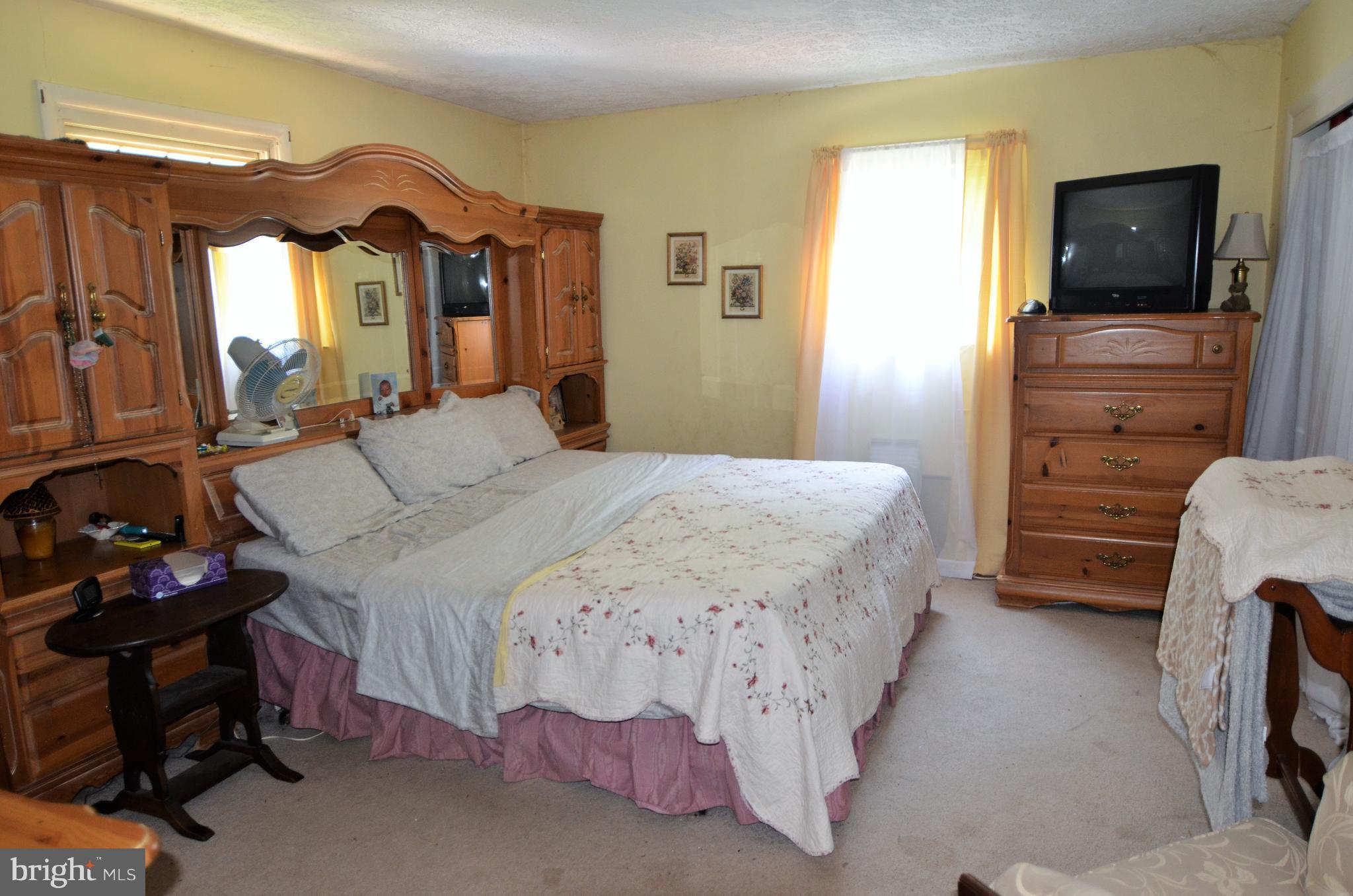820 Petem Road Kingsville, MD 21087 - Photo 22 of 30 a bedroom with a bed and a television