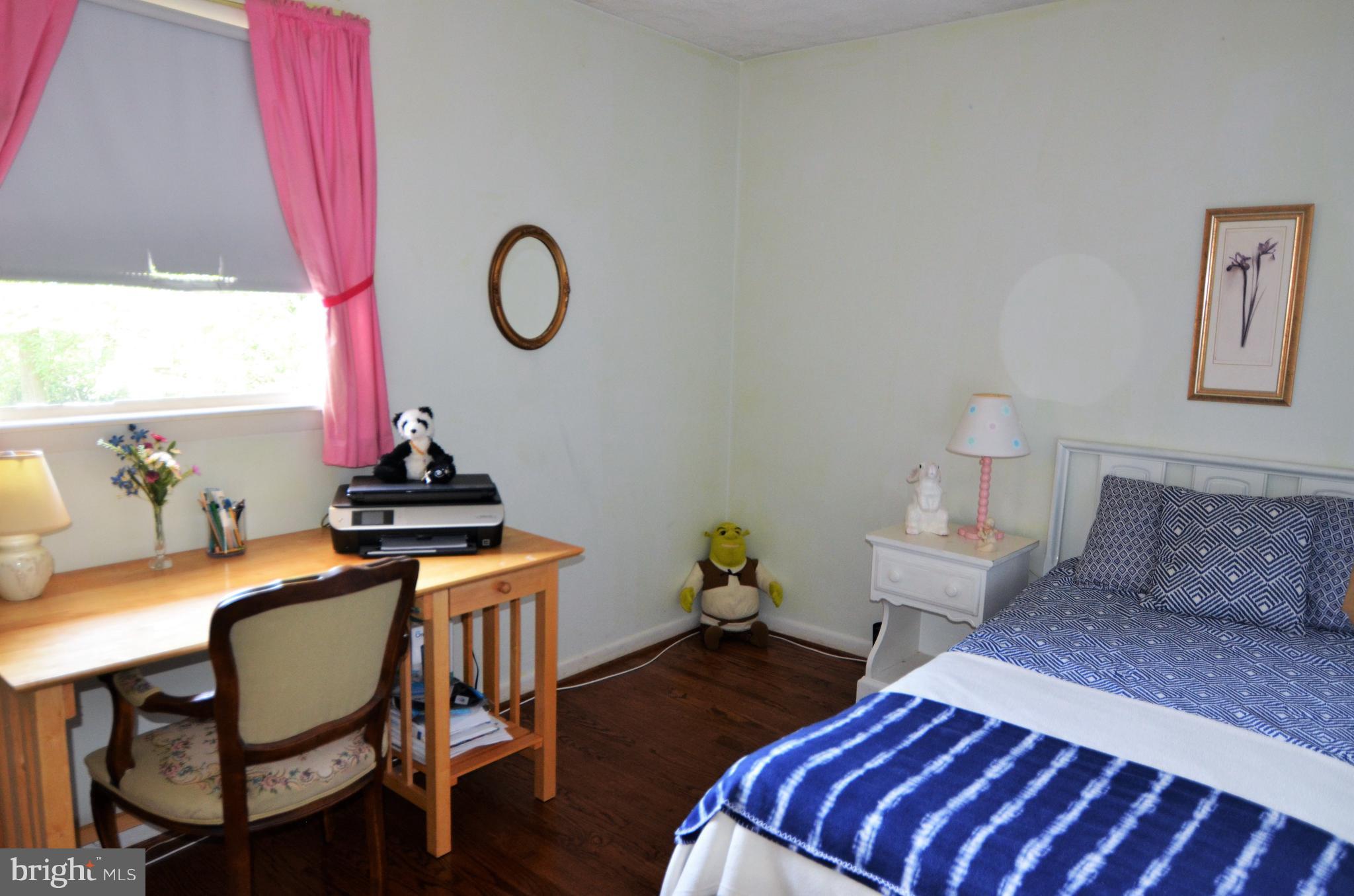 820 Petem Road Kingsville, MD 21087 - Photo 23 of 30 a bedroom with a bed and a table in it