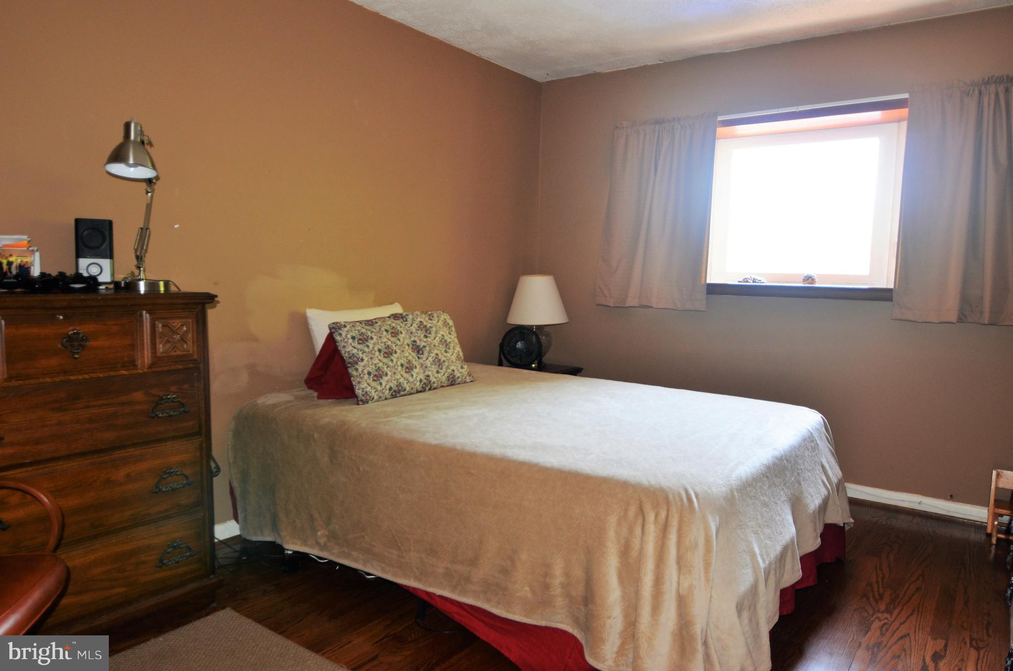 820 Petem Road Kingsville, MD 21087 - Photo 24 of 30 a bedroom with a bed and a window