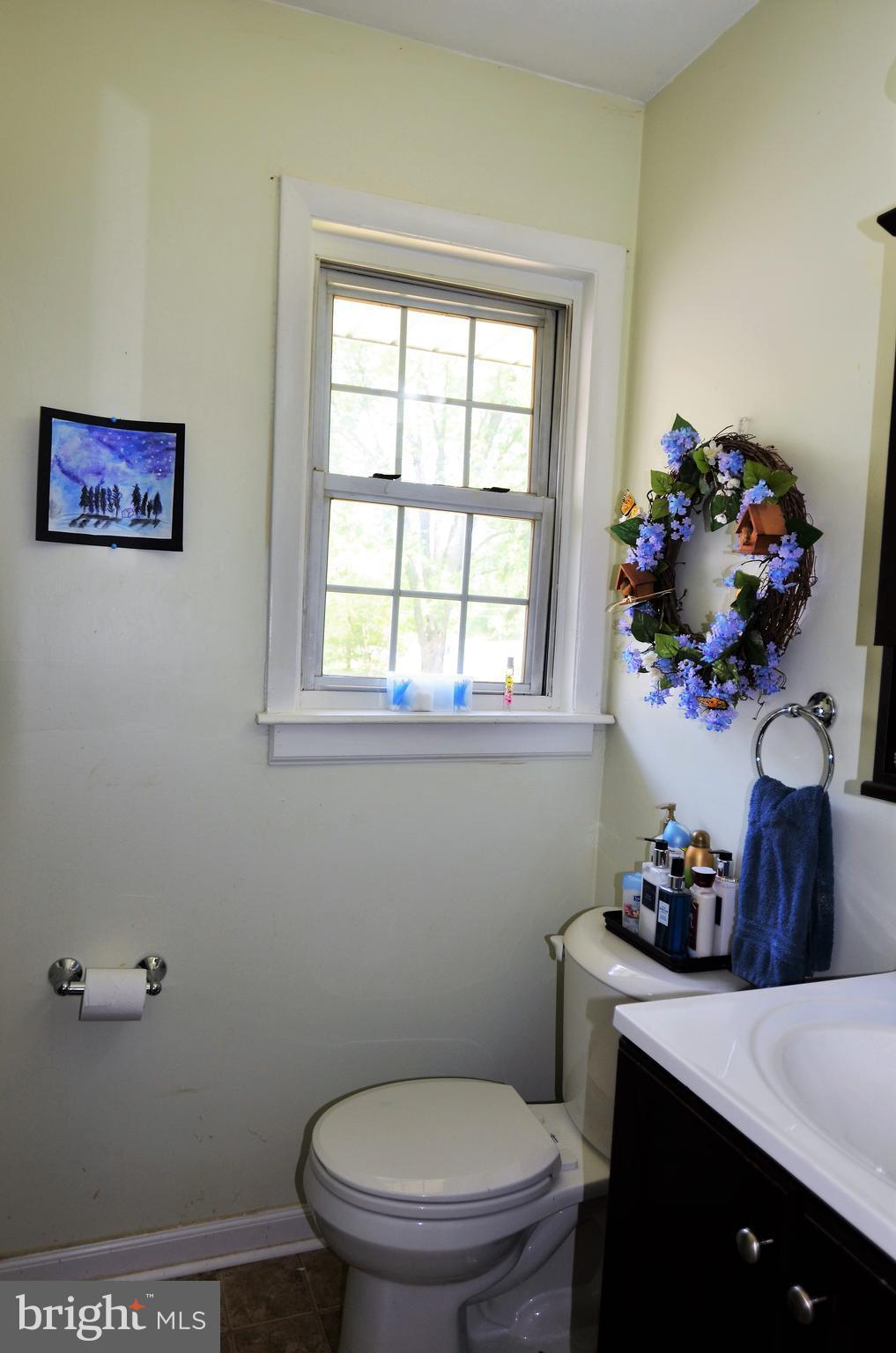 820 Petem Road Kingsville, MD 21087 - Photo 27 of 30 a bathroom with a toilet sink and mirror