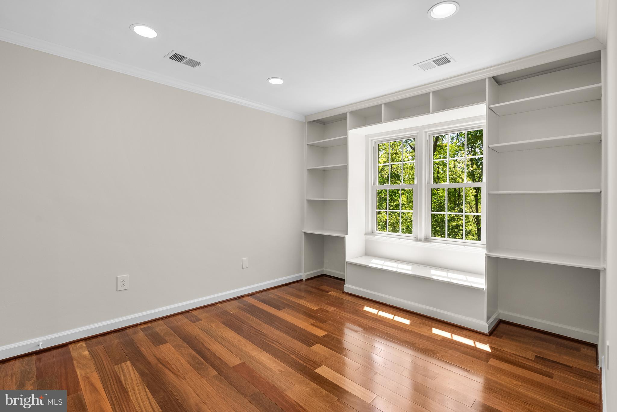 10717 Midsummer Drive Reston, VA 20191 - Photo 22 of 35 wooden floor in an empty room with a window