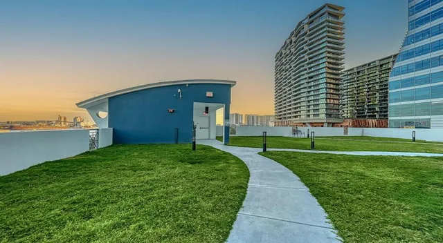 a view of a balcony with chairs