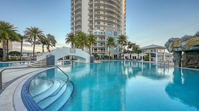 a view of pool with outdoor seating