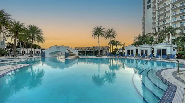 a view of a patio with swimming pool