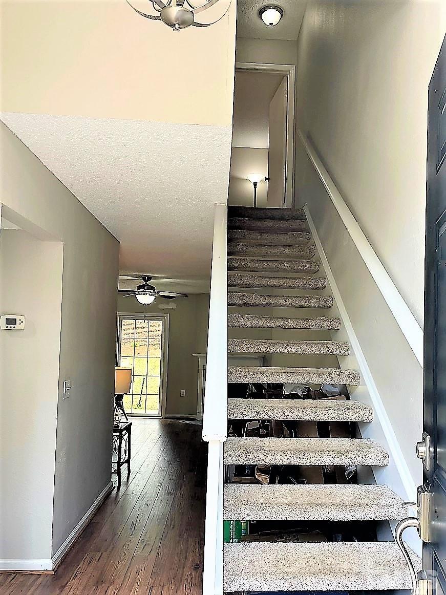 2416 Condor Court Raleigh, NC 27615 - Photo 3 of 28 a view of entryway and hall with wooden floor
