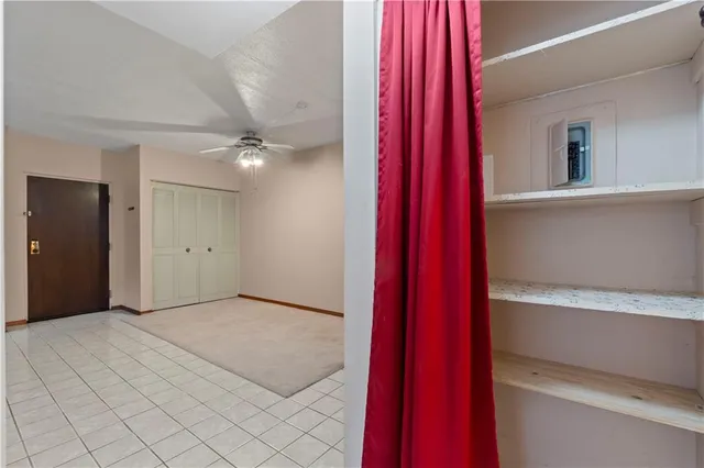 a view of a hallway with a large window