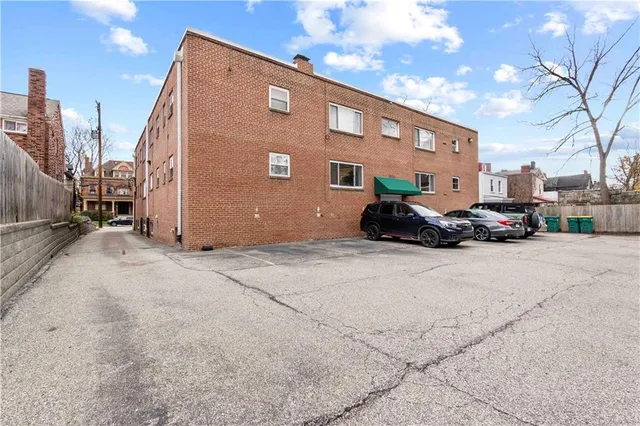 a car parked in front of a building