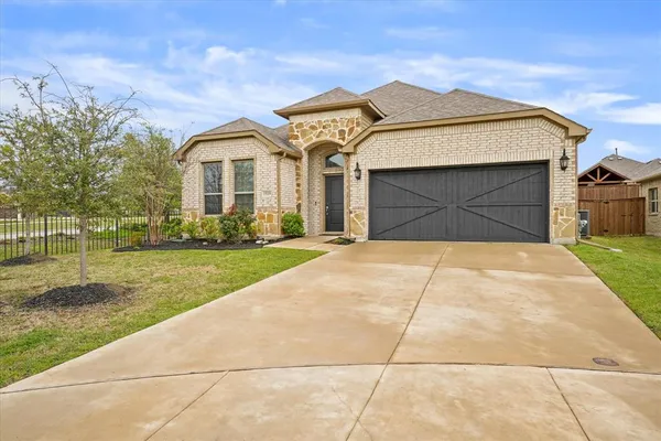 a front view of house with yard