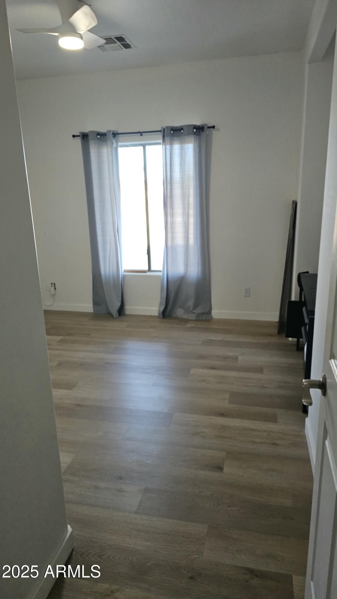 33340 West Lower Buckeye Road Tonopah, AZ 85354 - Photo 16 of 28 a view of an empty room with a window