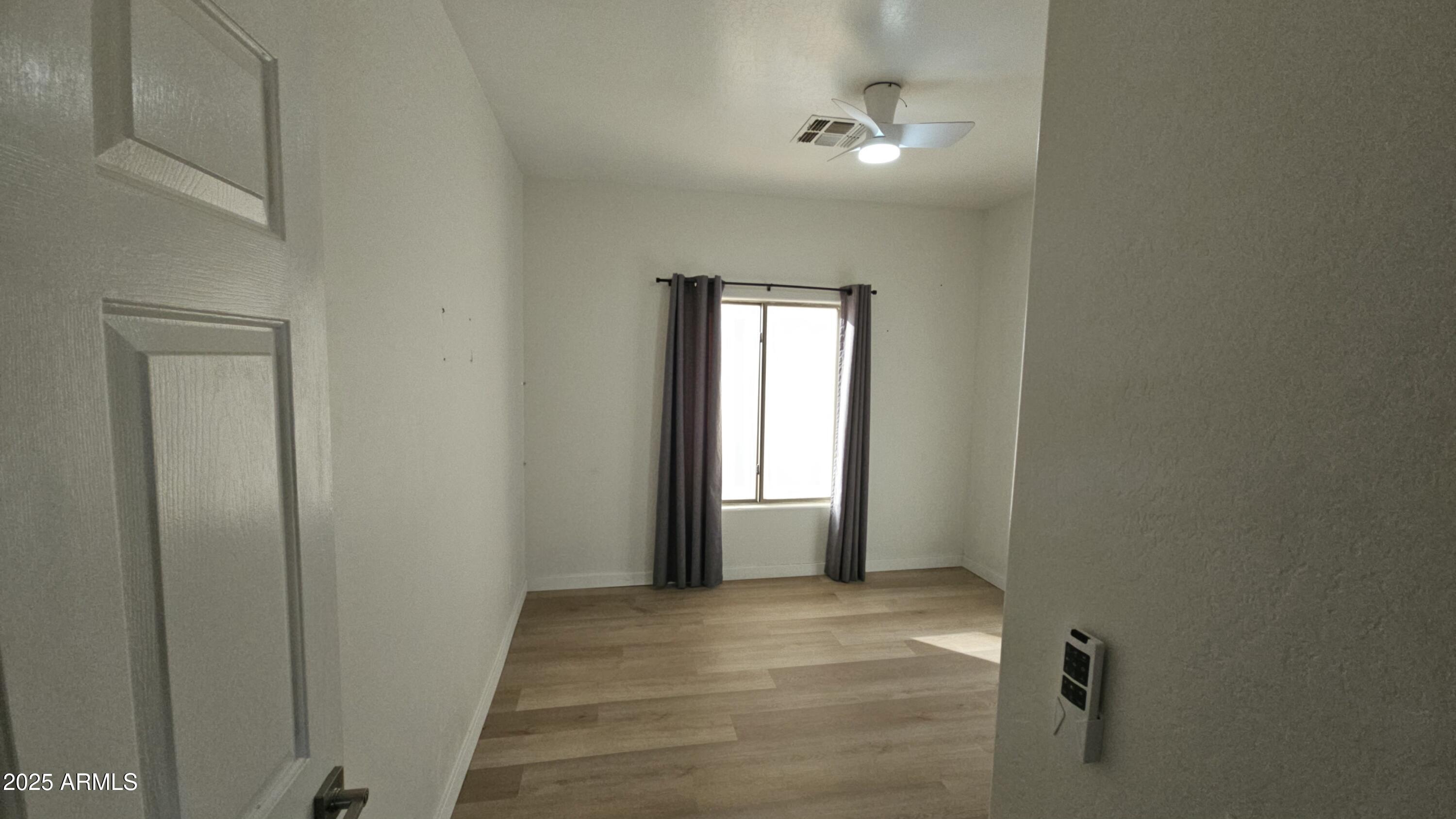 33340 West Lower Buckeye Road Tonopah, AZ 85354 - Photo 20 of 28 a view of an empty room and window