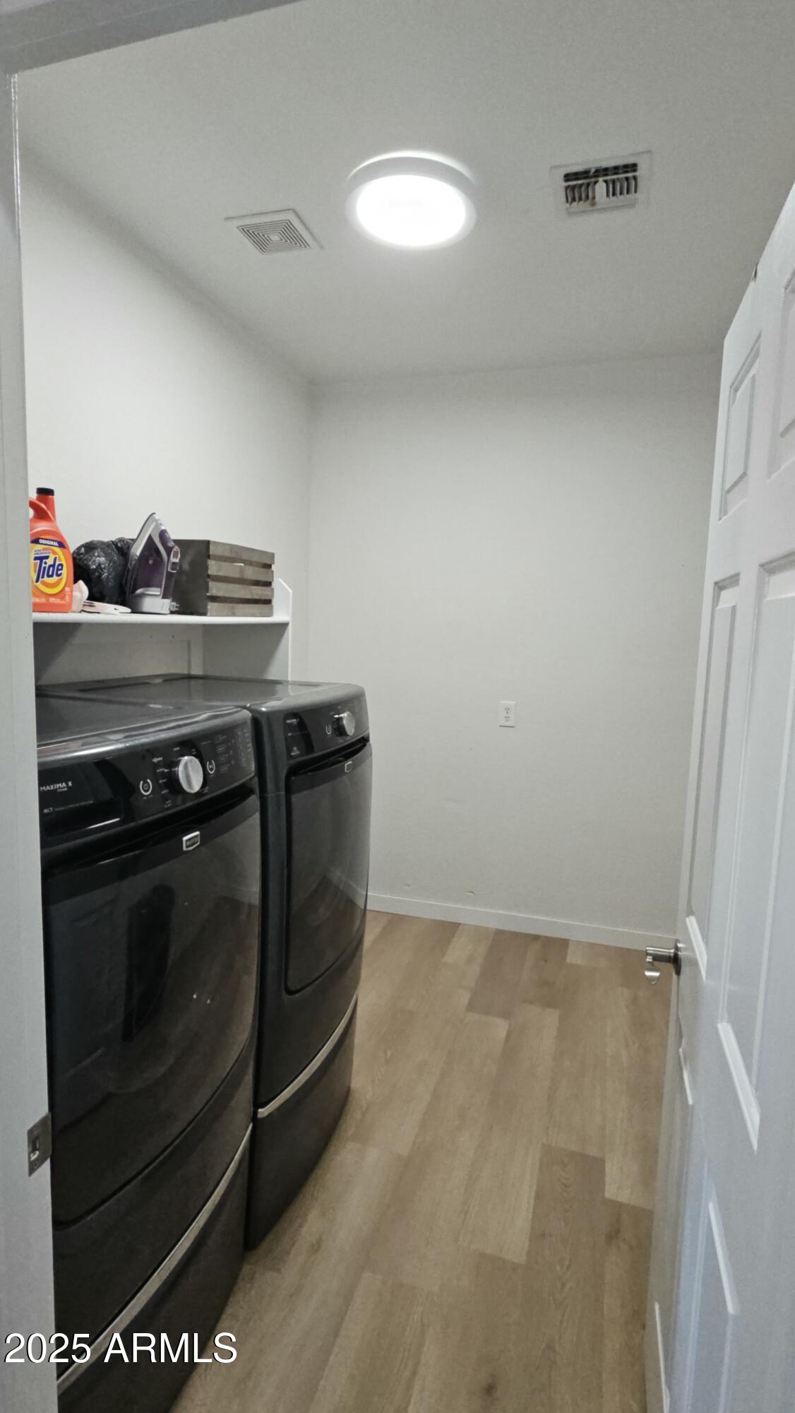 33340 West Lower Buckeye Road Tonopah, AZ 85354 - Photo 22 of 28 a utility room with washer and dryer